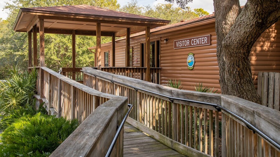 Camp Helen State Park showing signage and a bridge
