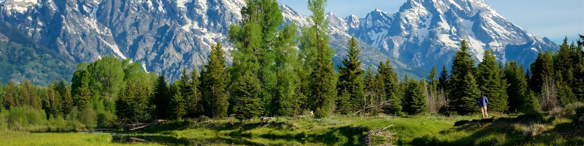 Schwabacher\'s Landing showing a river or creek, mountains and tranquil scenes