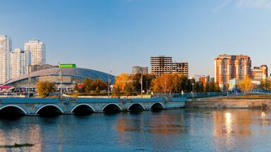 Panorama of the autumn embankment of the river Miass