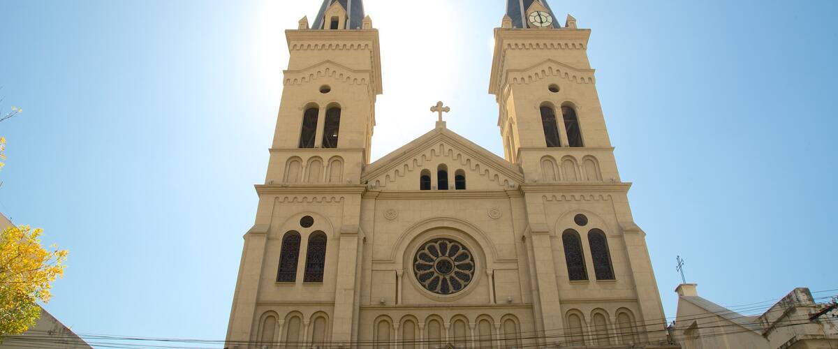 A church with two towers and a large central window.