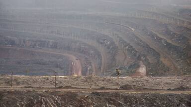 A mining area with multiple roads and tracks.