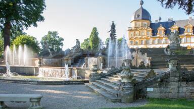 Seehof Palace featuring heritage architecture and a fountain