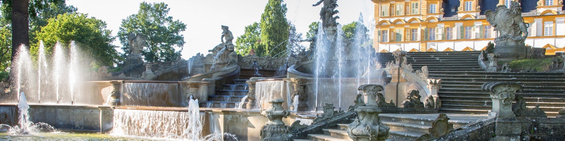 Seehof Palace featuring heritage architecture and a fountain