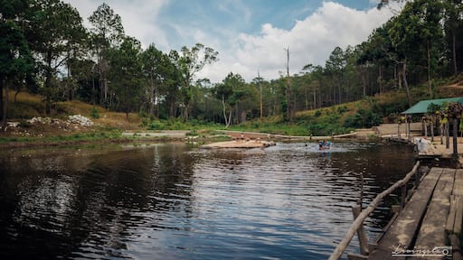 There are many attractions very close to the dusty, crowded and noisy city of PhnomPenh in Cambodia . Kirirom (Mountain of joy) NationalPark is one among them, a nice day trip about 100 km from the city , depending on traffic, should be a 2.5 to 3 hours drive. And specially interesting is the Chambok Ecotourism site.
Located in the Kampong Speu Province , this beautiful landscape was a visual treat. I could witness the whole scene change right before my eyes as the climb towards the Mountains started. This mountain had varied colours of flora at different heights and is completely different to what you see elsewhere in the country.
If you are ever in this mountain / National Park, do not miss the opportunity to sit by a river or a #lake or a waterfall and experience the calm of the wilderness. There were tiny fish in the slow waters, kingfishers nearby waiting for their catch, the pine forests at a distance and loads of butterflies
You get to see carefree kids come in for a dip in this river just after lunch time and have the time of their life. What surprised me was their genuine happiness without those hi tech gadgets. The river was their joy and a few wooden planks assembled on top of 4 large / empty plastic cans was their joy ride in the river. Nothing seemed to stop them from being wild and happy!