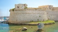 Gallipoli Castle which includes a castle, general coastal views and heritage architecture