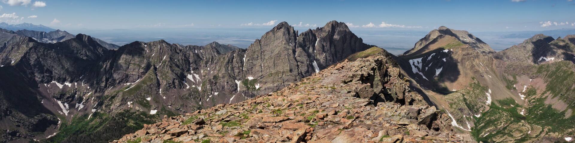 View from summit of Humboldt Peak looking West towards Crestone Needle and Crestone Peak with Kit Carson Mountain on the right in the Sangre de Cristo Mountains, Colorado