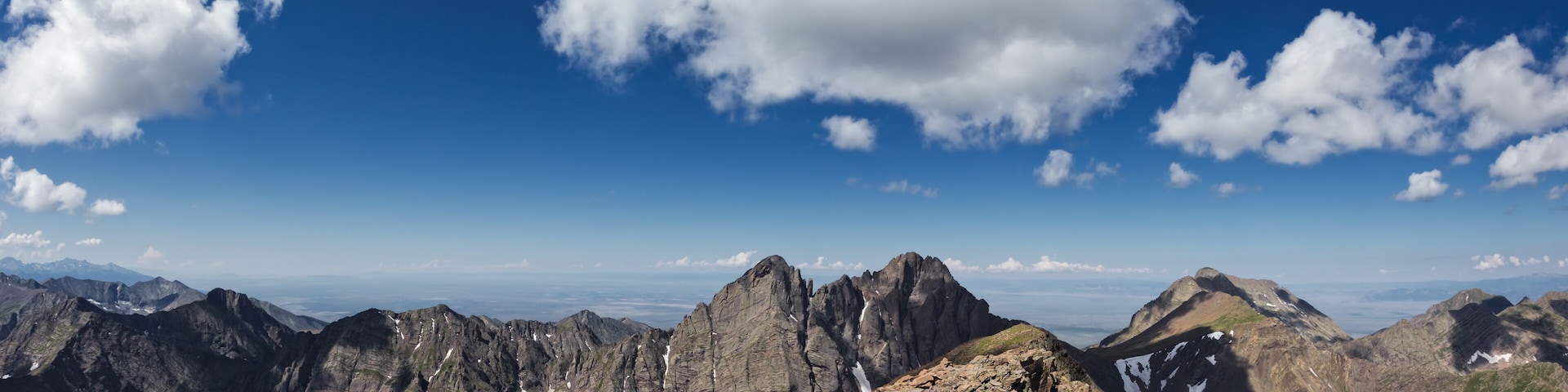 View from summit of Humboldt Peak looking West towards Crestone Needle and Crestone Peak with Kit Carson Mountain on the right in the Sangre de Cristo Mountains, Colorado