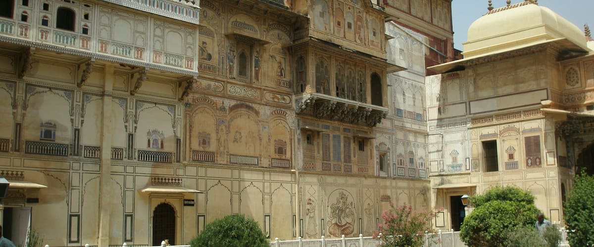 Karauli City Palace, former residence of the royal family. This palace is ornamented with stucco work & frescoes dating from the 18th century