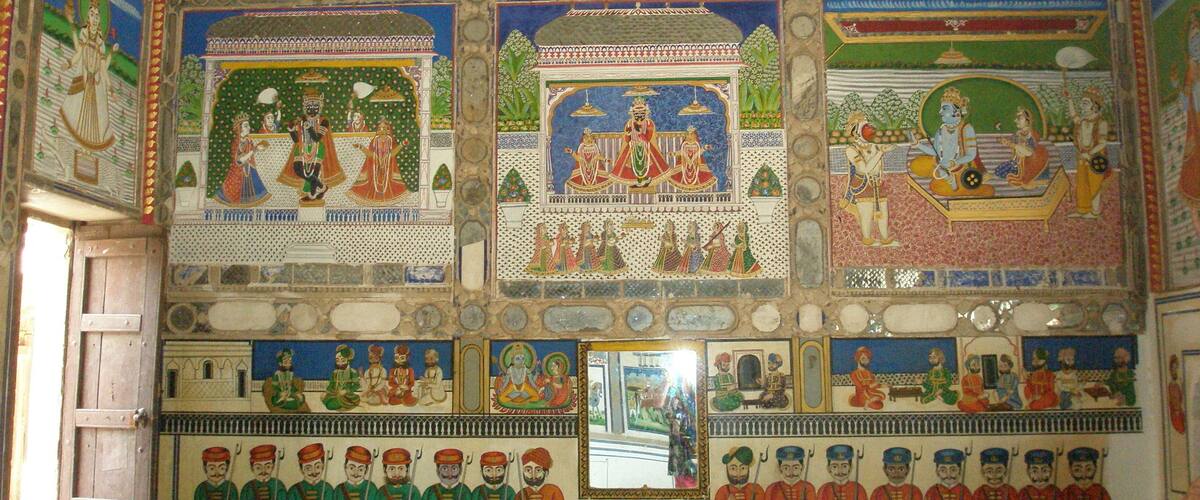 Karauli City Palace, former residence of the royal family. This palace is ornamented with stucco work & frescoes dating from the 18th century