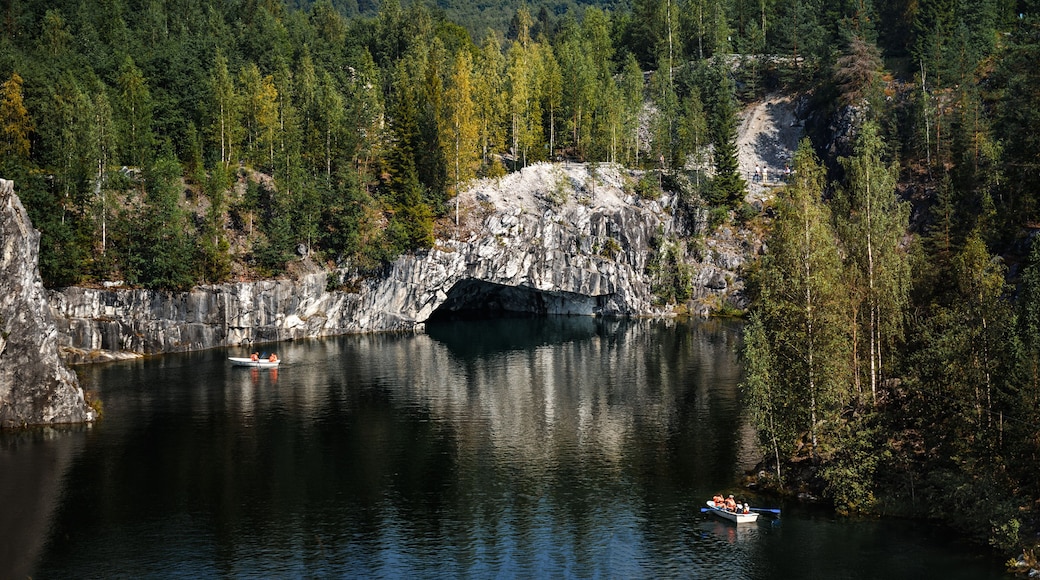 The marble quarry "Ruskeala" filled with groundwater. Nature of Karelia. Summer in the northern forests.