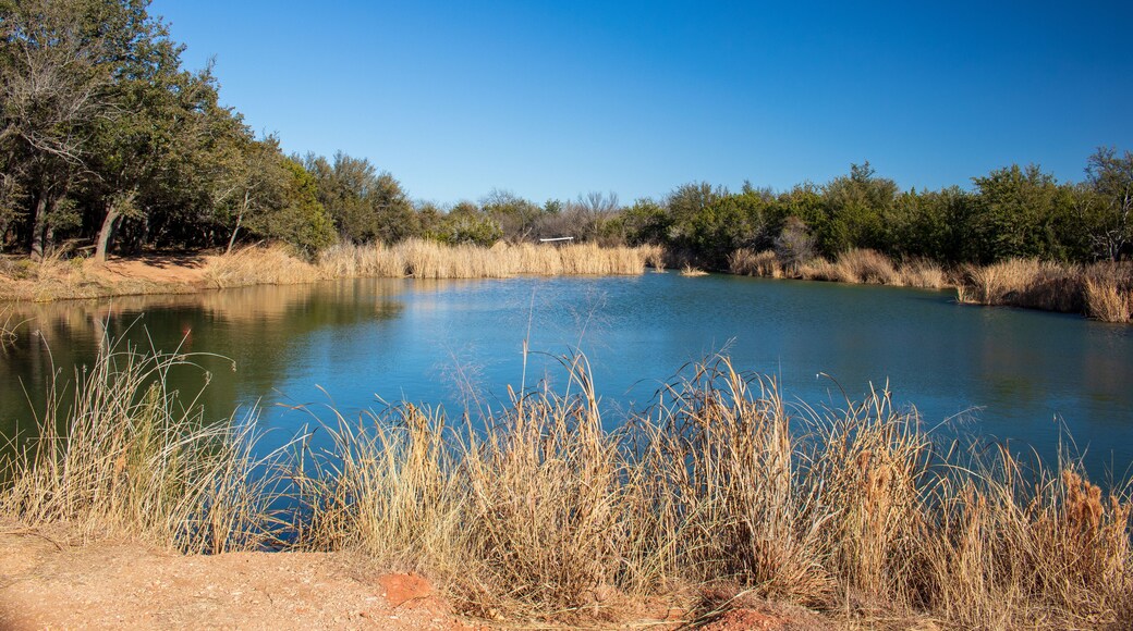 A beautiful fishing pond in a nature park located in Abilene State Park Texas