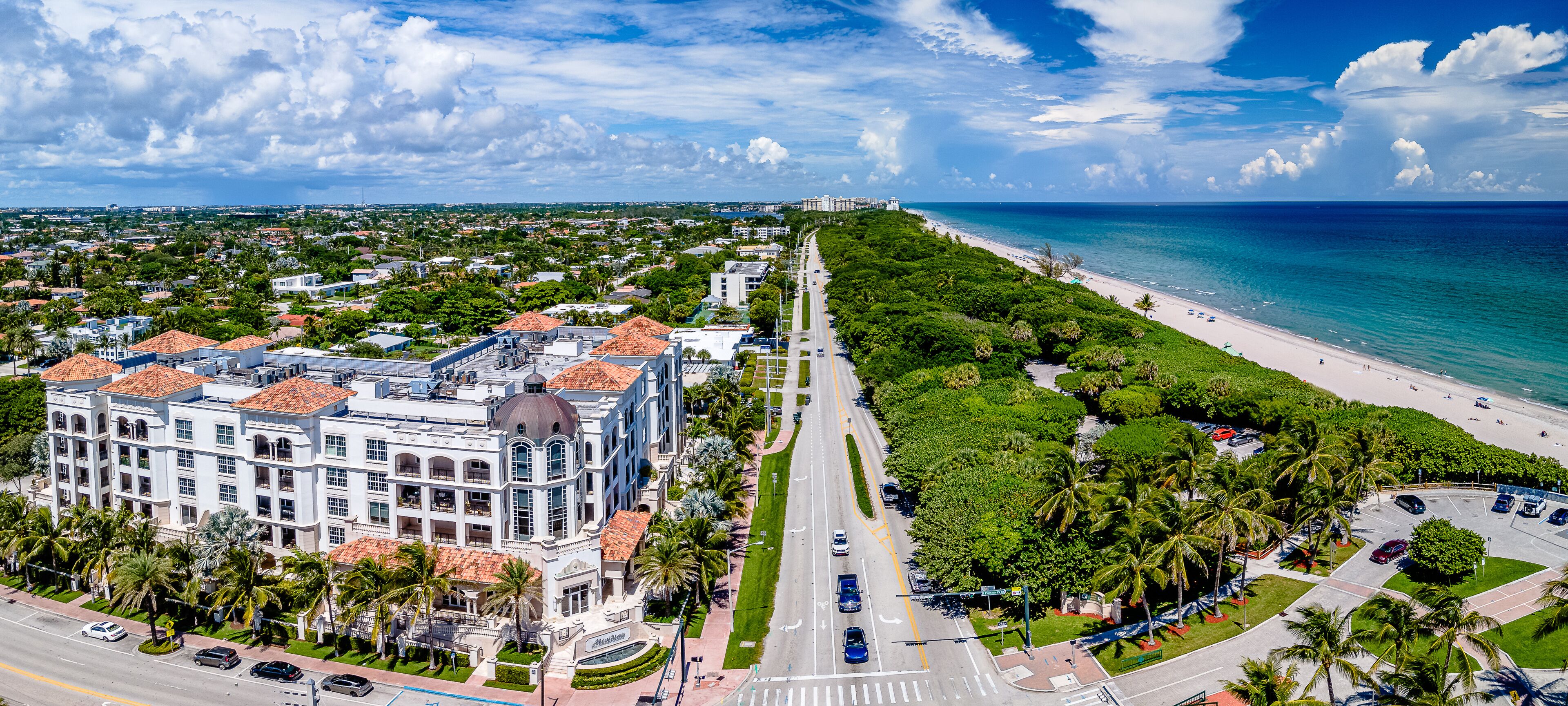 high aerial drone panoramic view of Beach in Boca Raton, Florida with city

