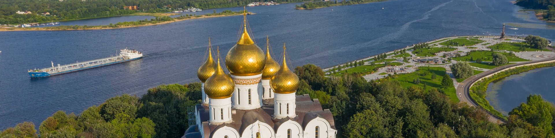 Aerial view of the Assumption Cathedral in Yaroslavl, park Strelka and Volga river