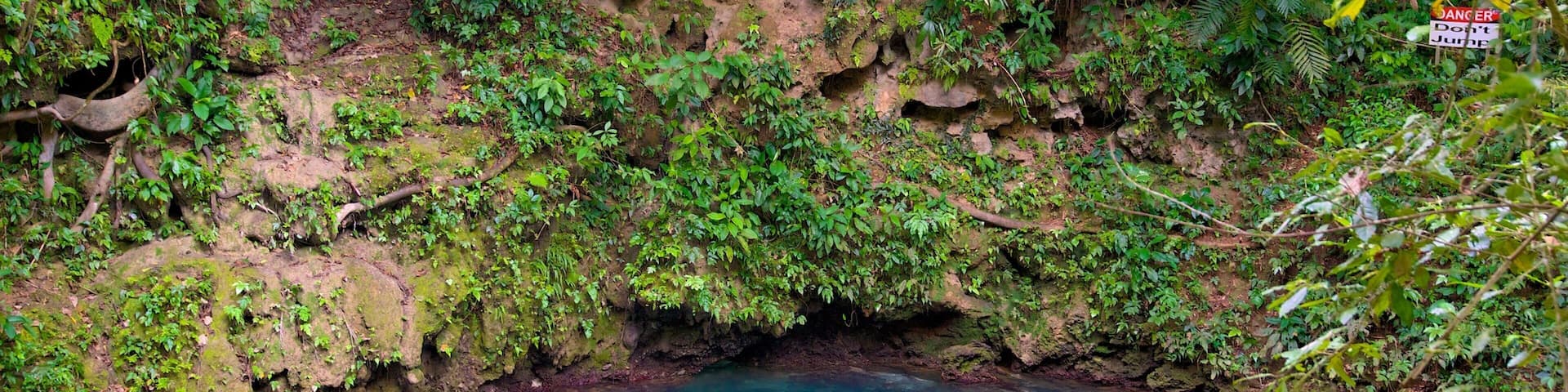 Blue Hole National Park showing swimming, tranquil scenes and a lake or waterhole