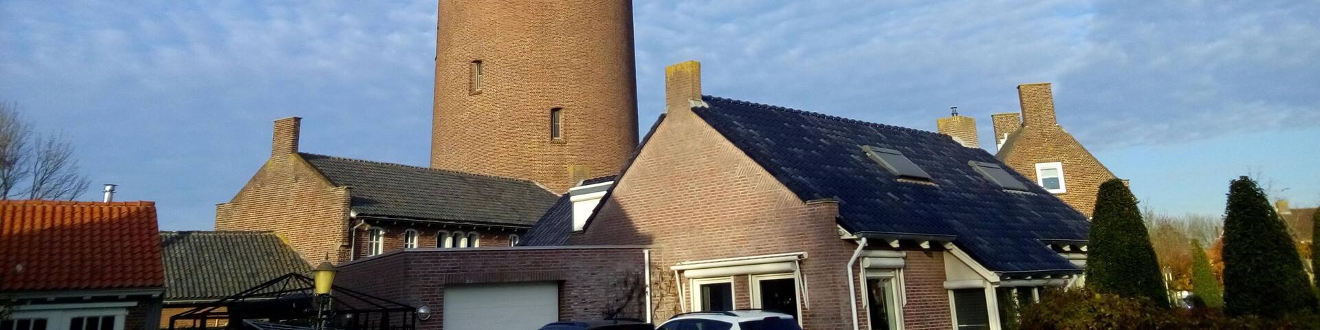 the water tower in steenbergen, holland, with a blue cloudy sky