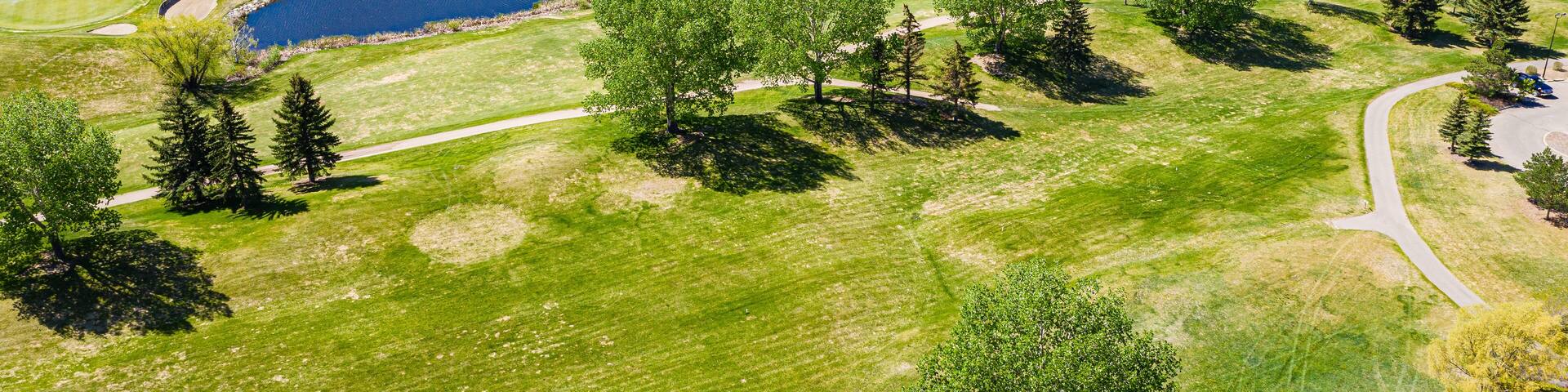 Golf course with a lake in the middle