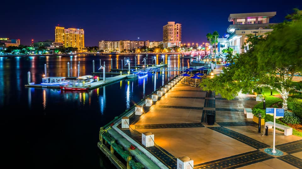 View of the Riverwalk at night in Tampa, Florida.