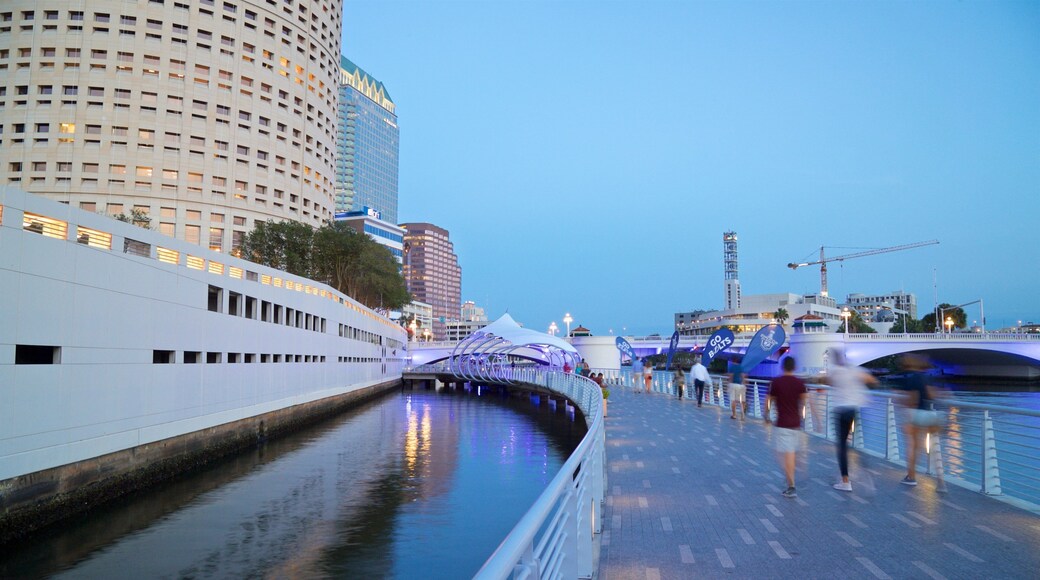 Tampa Riverwalk featuring a bridge and a river or creek
