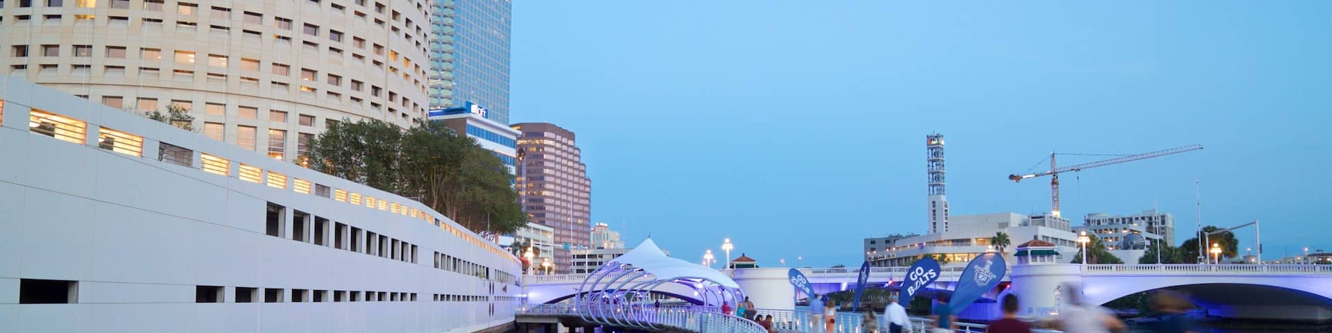 Tampa Riverwalk featuring a bridge and a river or creek