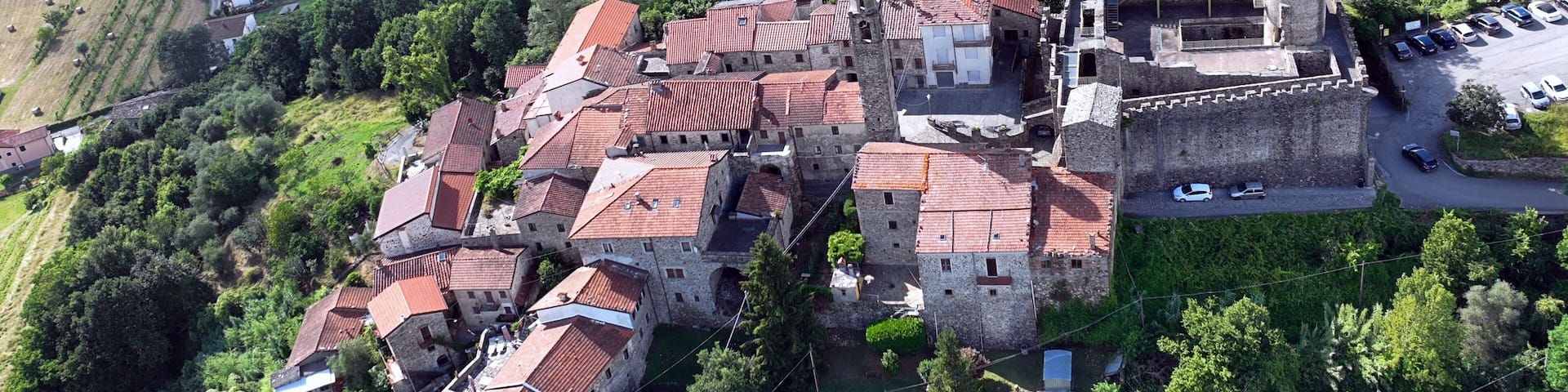 Aerial view of Malgrate village an his the Malaspina castle. Malgrate, Villafranca in Lunigiana, Massa Carrara, Italy.