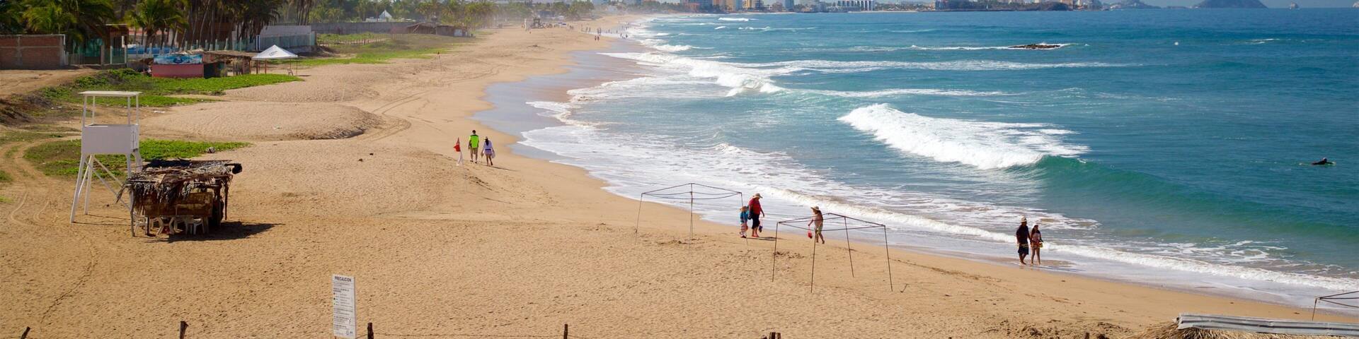 Mazatlan featuring waves and a beach