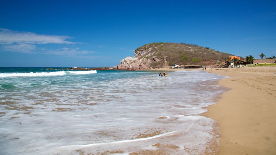 Mazatlan featuring a beach, waves and general coastal views