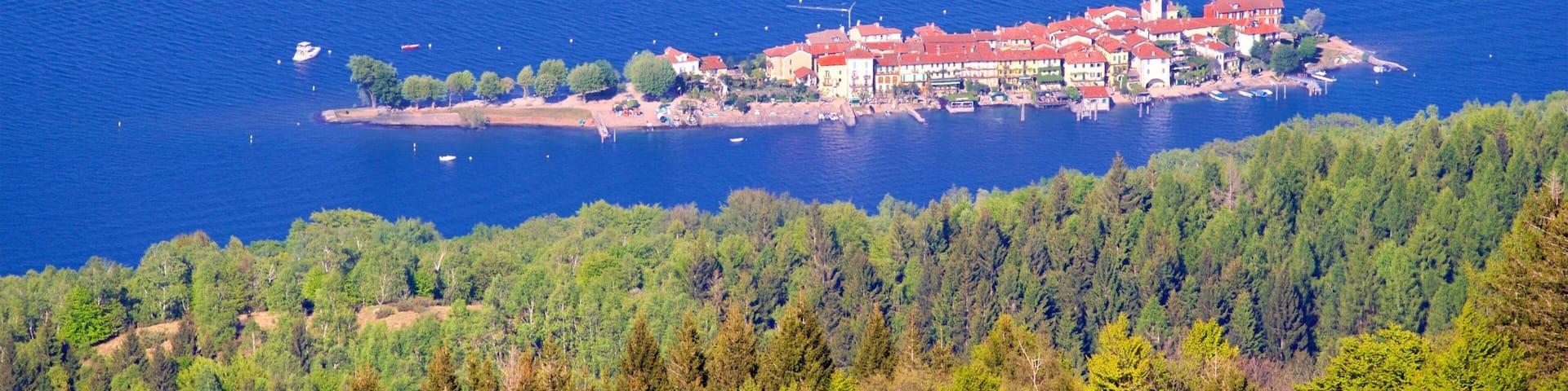 Mottarone showing island images, a small town or village and a lake or waterhole