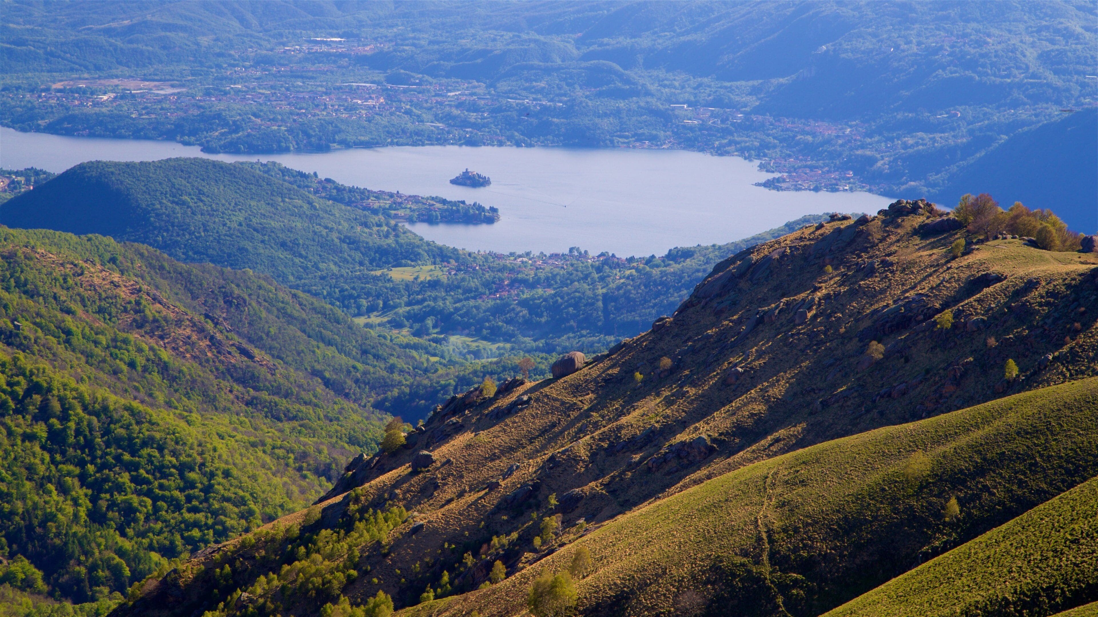 Mottarone which includes mountains, a river or creek and tranquil scenes