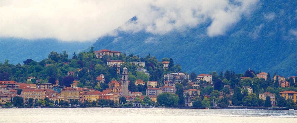 Villa Fedora which includes a lake or waterhole, a small town or village and mountains