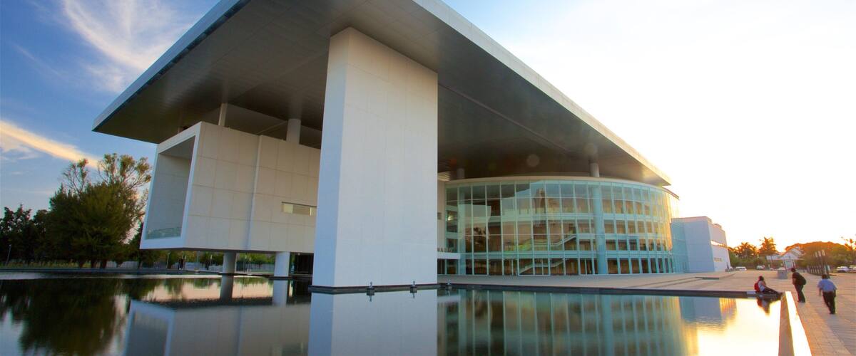 Bicentennial Theatre showing a square or plaza, a lake or waterhole and modern architecture