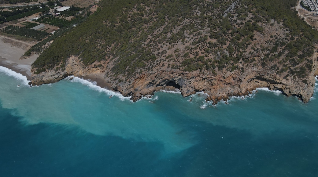 Aerial shot of a rocky hill in Yanisli Cave Beach, Gulnar, Mersin, Turkey