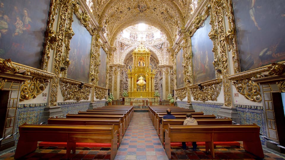 Puebla Historic Center which includes a church or cathedral, interior views and heritage elements