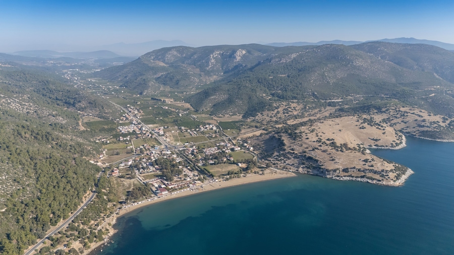 Aerial view over Ahmetbeyli coastal resort town in Menderes district of Izmir province in Turkey.