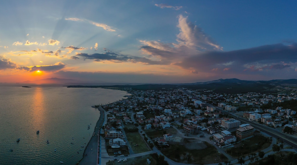 View of the pier and boats at sunset in Izmir, Aliaga, Yenisakran coast.