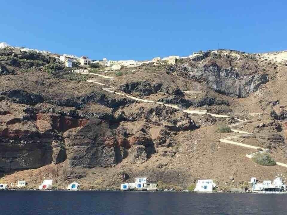 The steps and path going up to the town of Thirassia, an island in the volcanic island group of Santorini in the Greek Cyclades. It lies north-west of Nea Kameni, a small island formed in recent centuries by volcanic activity and thus marking the centre of the island group.