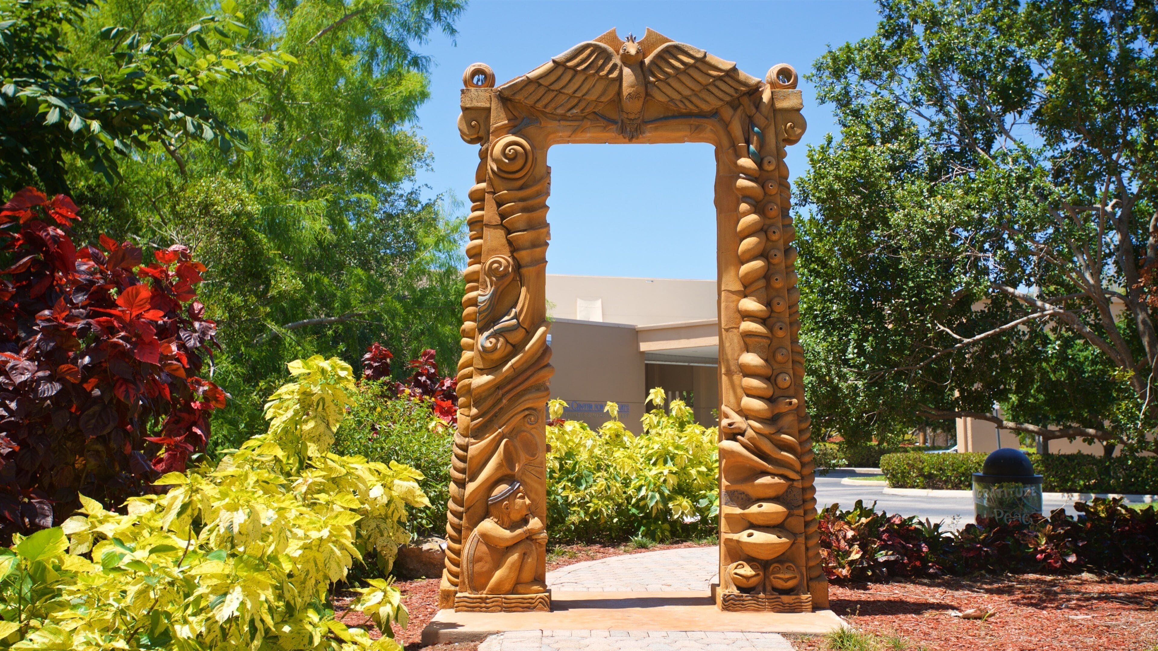 Coral Springs Museum of Art featuring outdoor art and a park