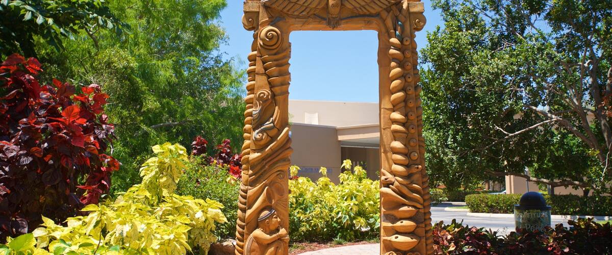 Coral Springs Museum of Art featuring outdoor art and a park