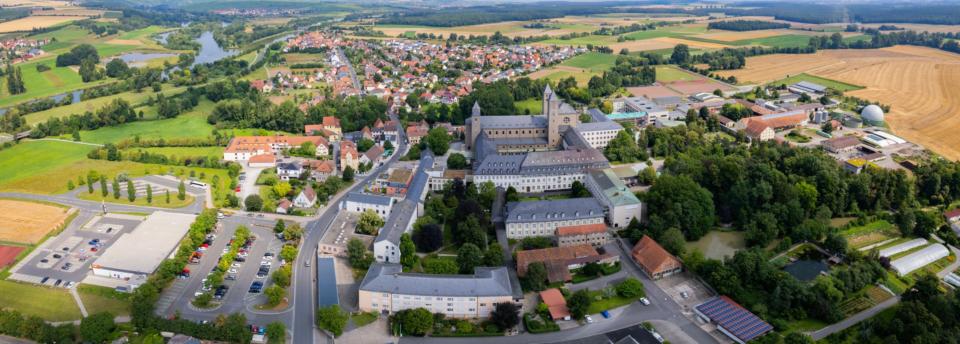 Aerial view around the old town in the city  Schwarzach am Main, on an sunny spring morning