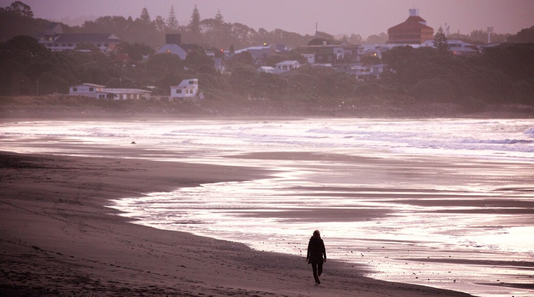 Fitzroy Beach featuring surf, a coastal town and a bay or harbor