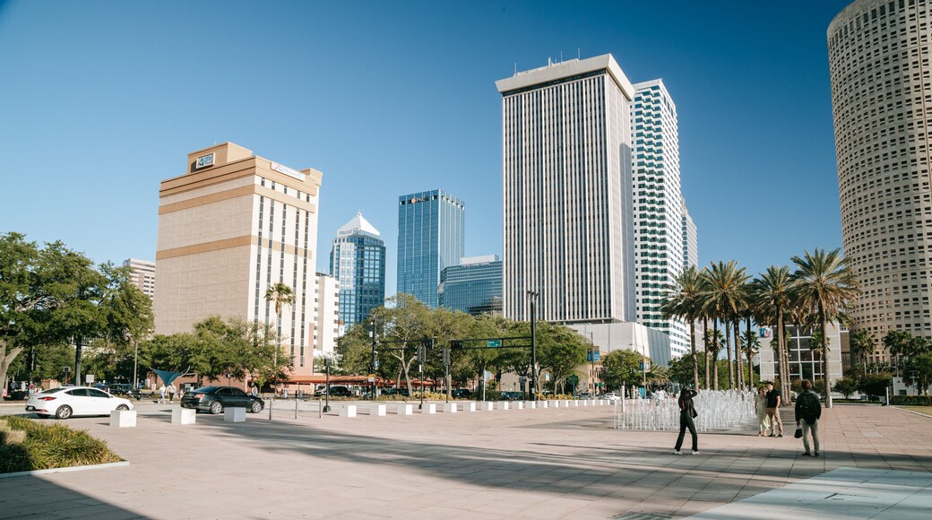 Curtis Hixon Waterfront Park which includes street scenes, a fountain and a square or plaza