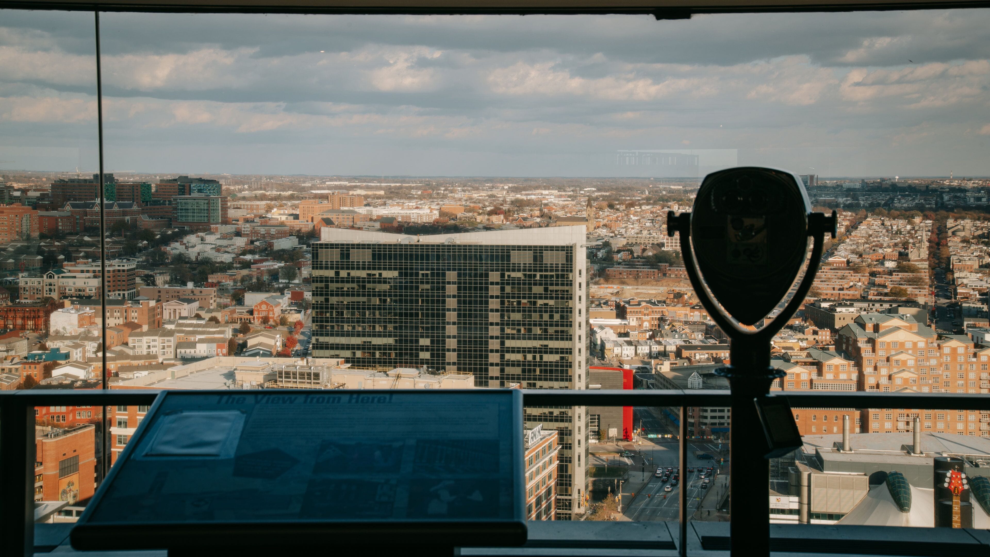 Top of the World Observation Level featuring views and a city