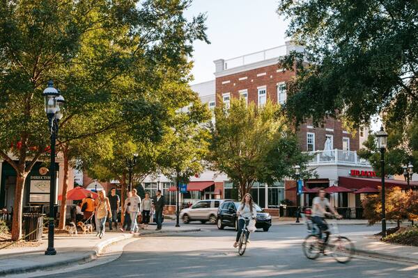 Birkdale Village showing cycling and street scenes as well as a couple