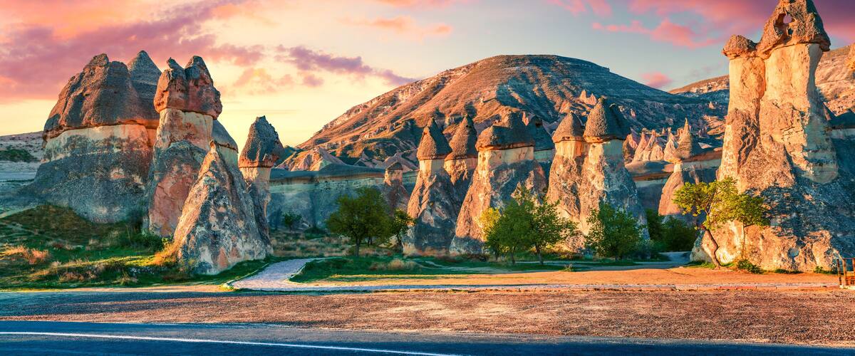 Impressive fungous forms of sandstone in the canyon near Cavusin village, Cappadocia, Nevsehir Province in the Central Anatolia Region of Turkey, Asia. Beauty of nature concept background.