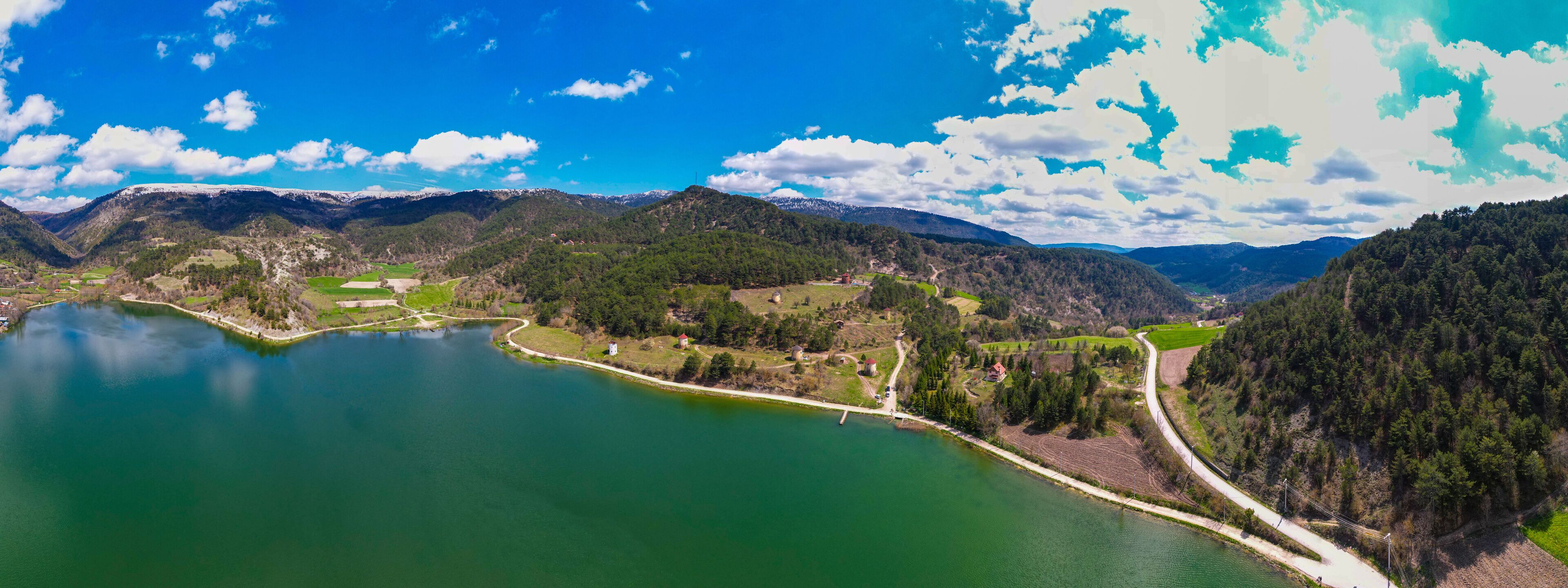 Cubuk Lake in Goynuk District of Bolu, Turkey.  Beautiful lake view with windmills. Shooting with drone.