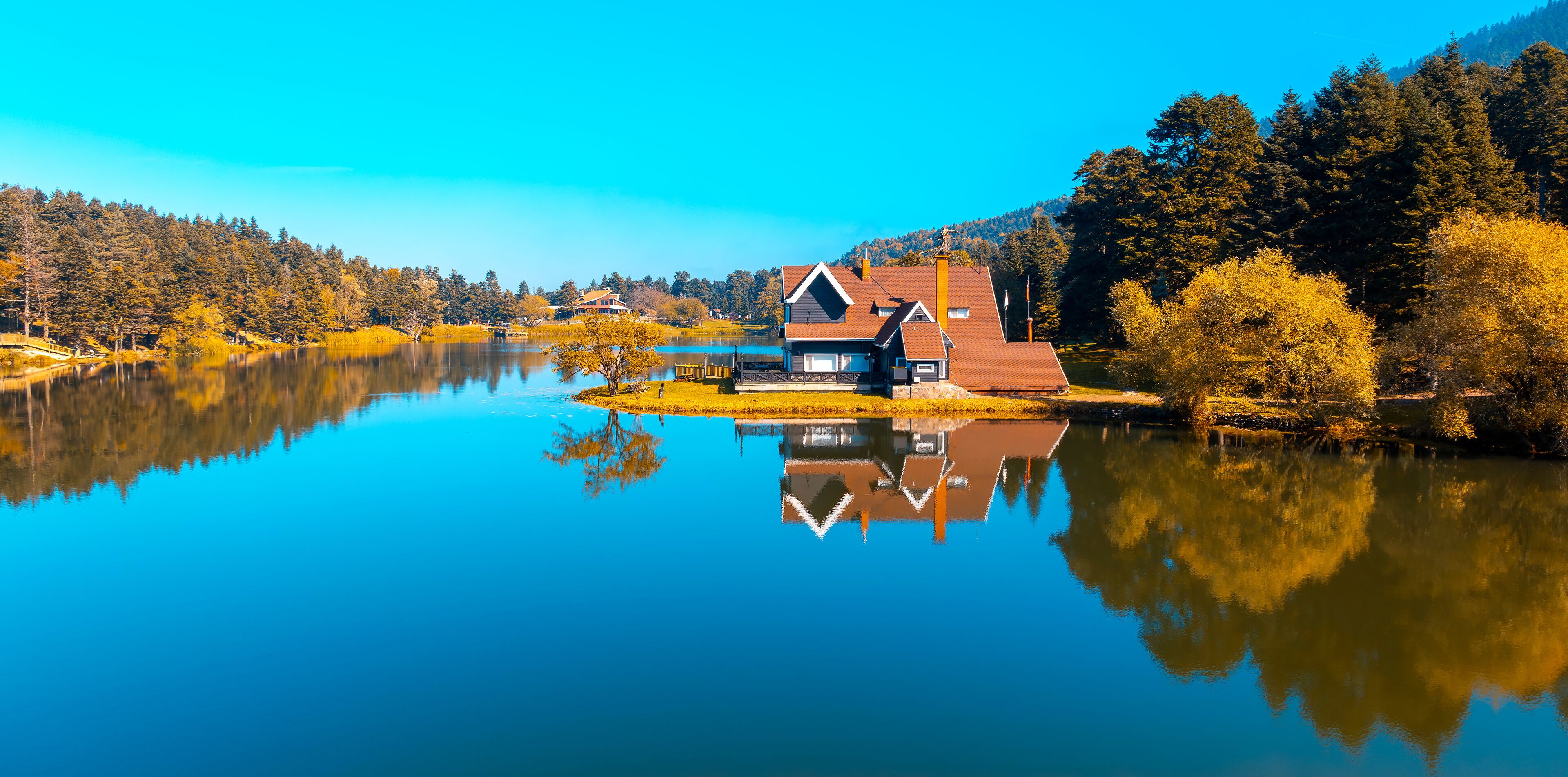 Bolu Golcuk Lake and famous house view with reflections.