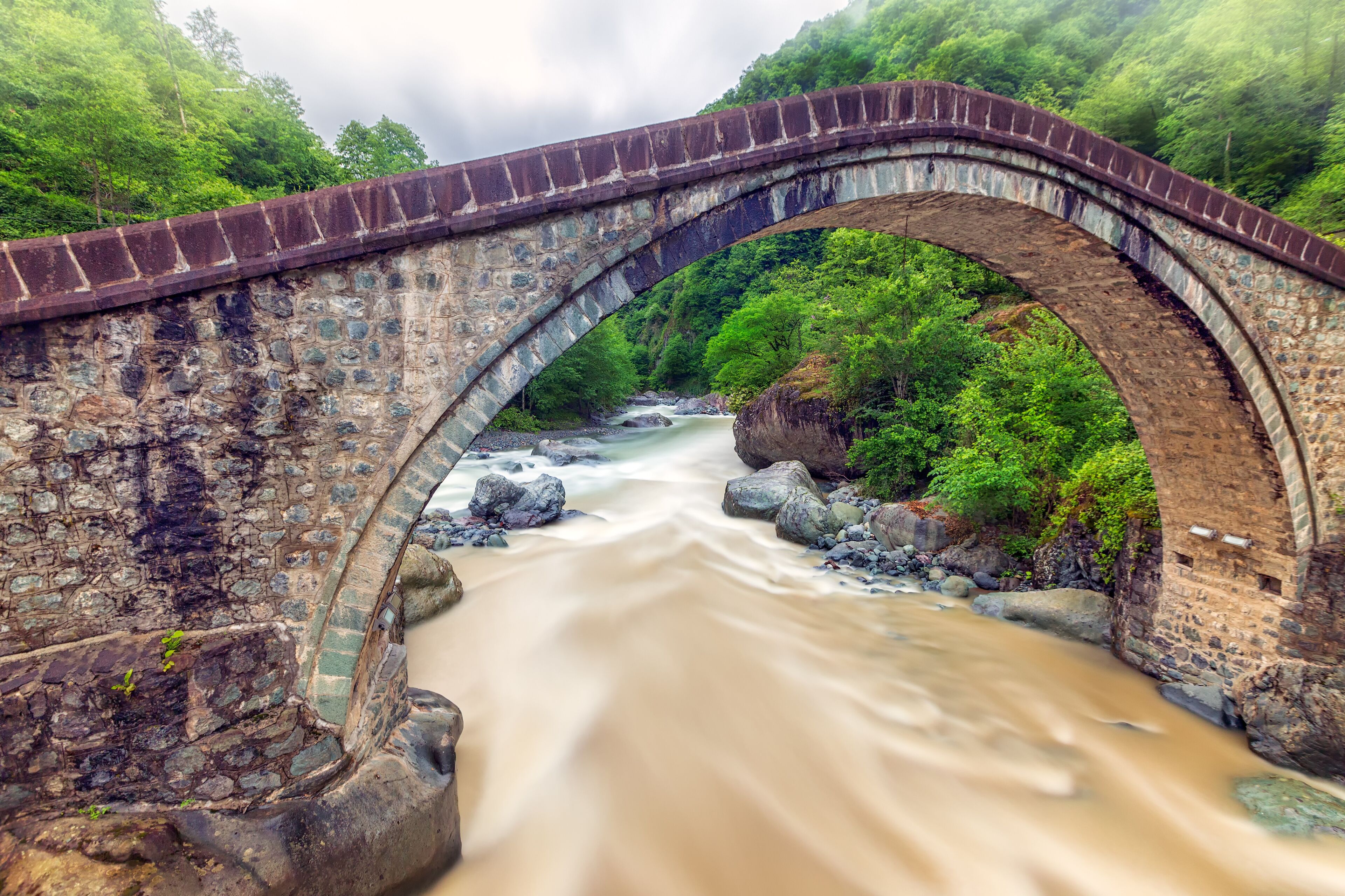 Landscape of the Double Bridge (Turkish: Cifte Kopru). It is the name for two small adjacent historic bridges in Arhavi, Artvin Province, northeastern Turkey. 