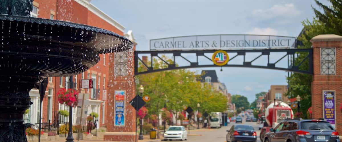 Carmel Arts and Design District showing signage and a fountain