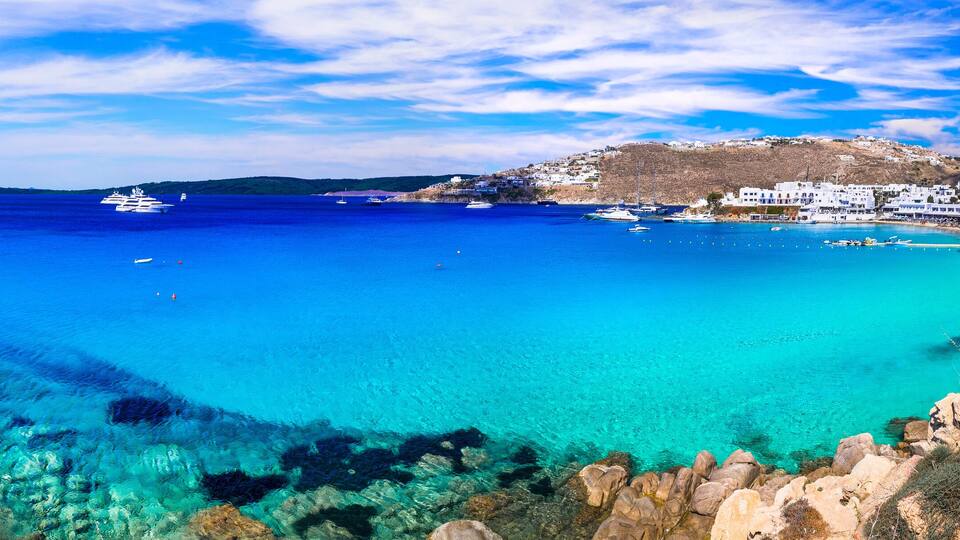 Greece summer holidays. Cyclades .Most famous and beautiful beaches of Mykonos island -Platis Gialos with crystal clear waters