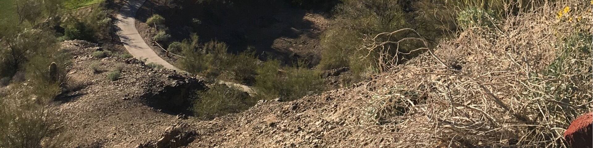 17th hole at the challenging and beautiful Emerald Canyon Golf Course in Parker AZ.
It's as though they moved mounds of dirt and carved some of the holes/fairways in the valleys.
You have to drive thru a tunnel under SR 95 to get to holes 4-5-6 then back for 7 and another tunnel for 15-16-17 then back for 18.
(Feb 2017)