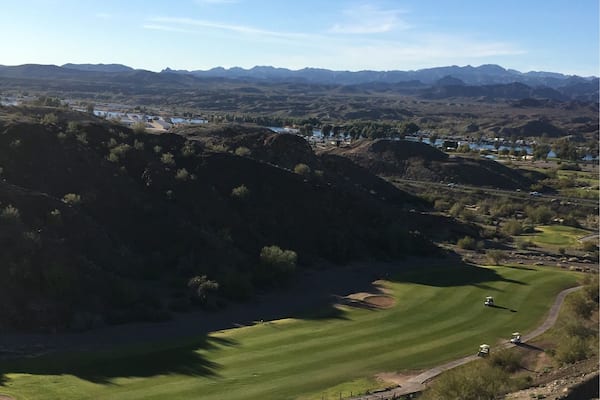 17th hole at the challenging and beautiful Emerald Canyon Golf Course in Parker AZ.
It's as though they moved mounds of dirt and carved some of the holes/fairways in the valleys.
You have to drive thru a tunnel under SR 95 to get to holes 4-5-6 then back for 7 and another tunnel for 15-16-17 then back for 18.
(Feb 2017)